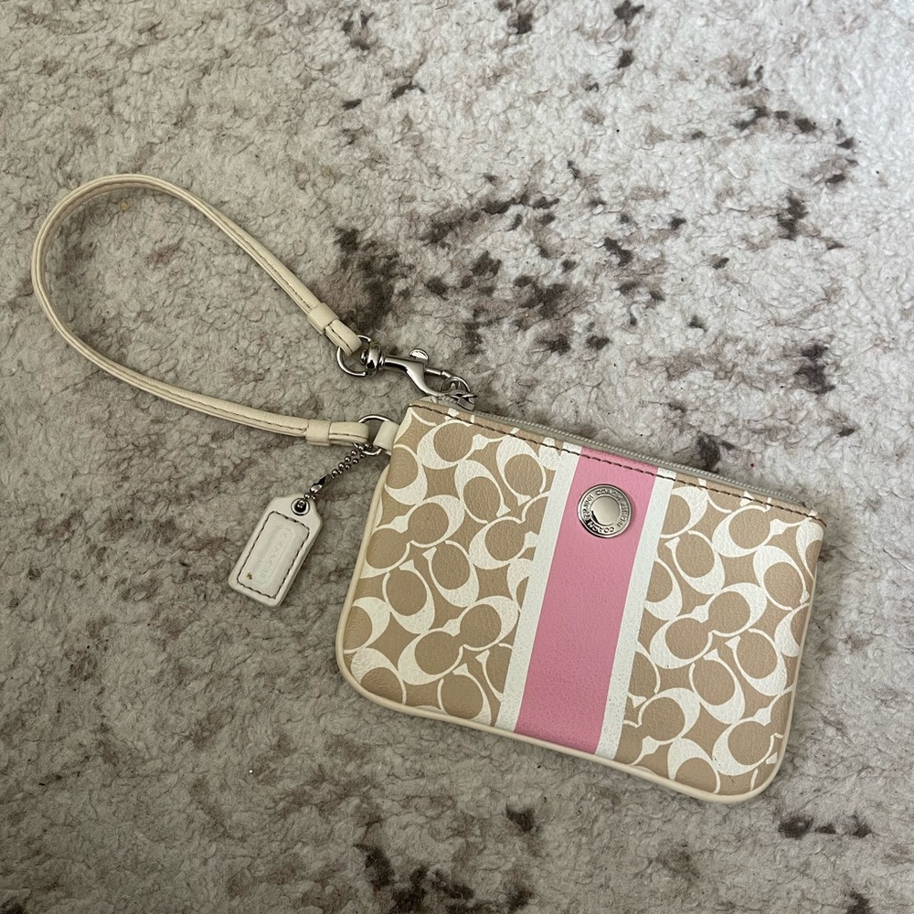 21. Coach wristlet